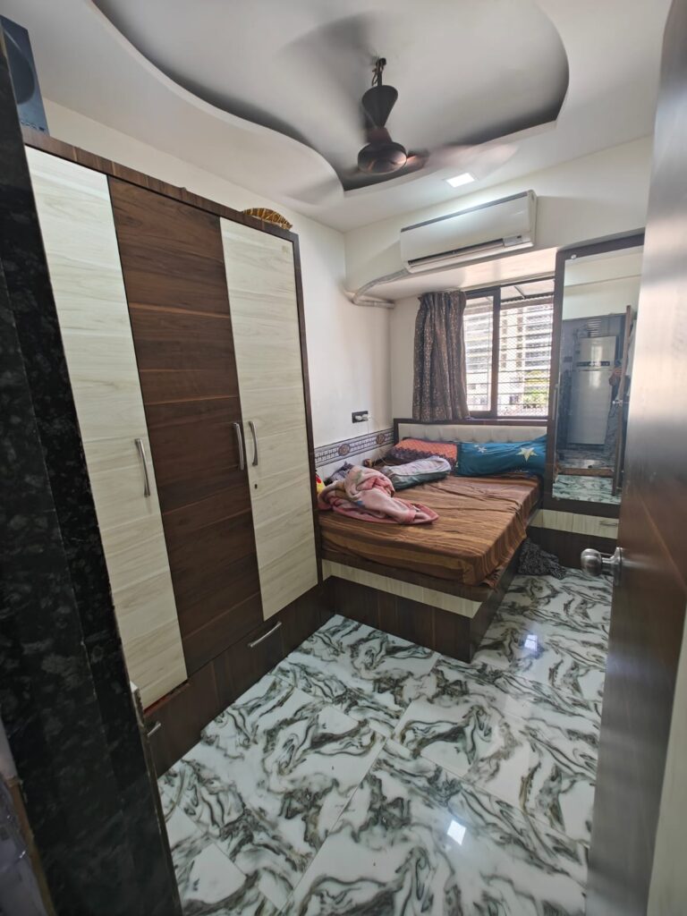"Fully furnished 2BHK apartment for rent at Amruti Samruti, Four Bungalows, Andheri West – immediate possession, ideal for professionals or families"