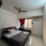 Private single occupancy bedroom with attached washroom in premium 4 BHK at Evershine Cosmic, Andheri West.