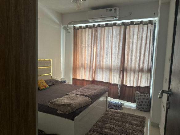 Fully furnished master bedroom single occupancy in 2BHK apartment at Sunteck City Avenue 1, Ram Mandir Road, Goregaon West for boys with gym and parking amenities