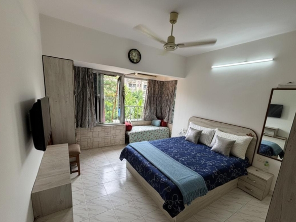 Fully furnished master bedroom single occupancy in 2BHK apartment at Mangal Orchid, Yari Road, near D-Mart, Andheri West open for boys and girls