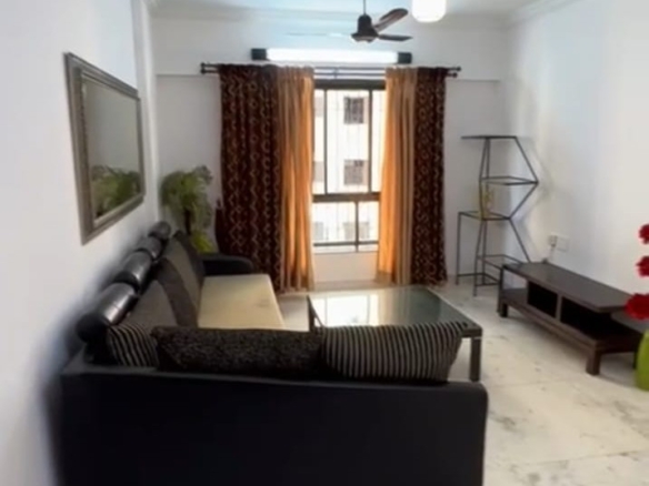 1 BHK fully furnished flat in Oshiwara with parking Spacious living room in 1 BHK Oshiwara apartment Bedroom of fully furnished 1 BHK flat in Oshiwara