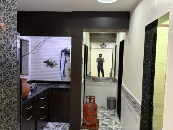 Fully furnished 2BHK apartment for rent in Amruti Smruti Building Four Bungalow Andheri West Mumbai opposite Kokilaben Hospital for bachelors, students, couples, and working professionals.